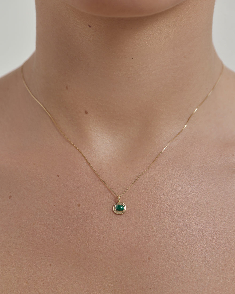 INTO THE FLOW MALACHITE CHARM (9K GOLD)